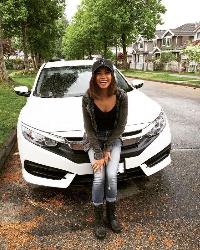 Picture of Louriza with her car